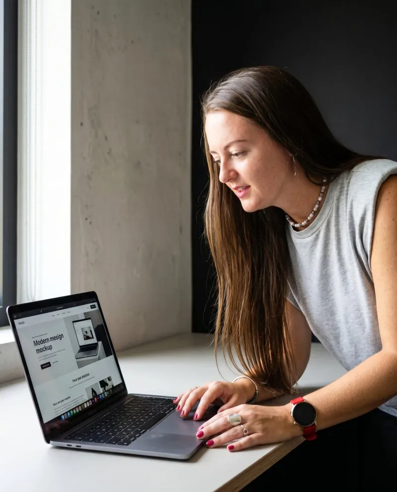 Niki reviewing a client website in a real working context ahead of a strategy session call